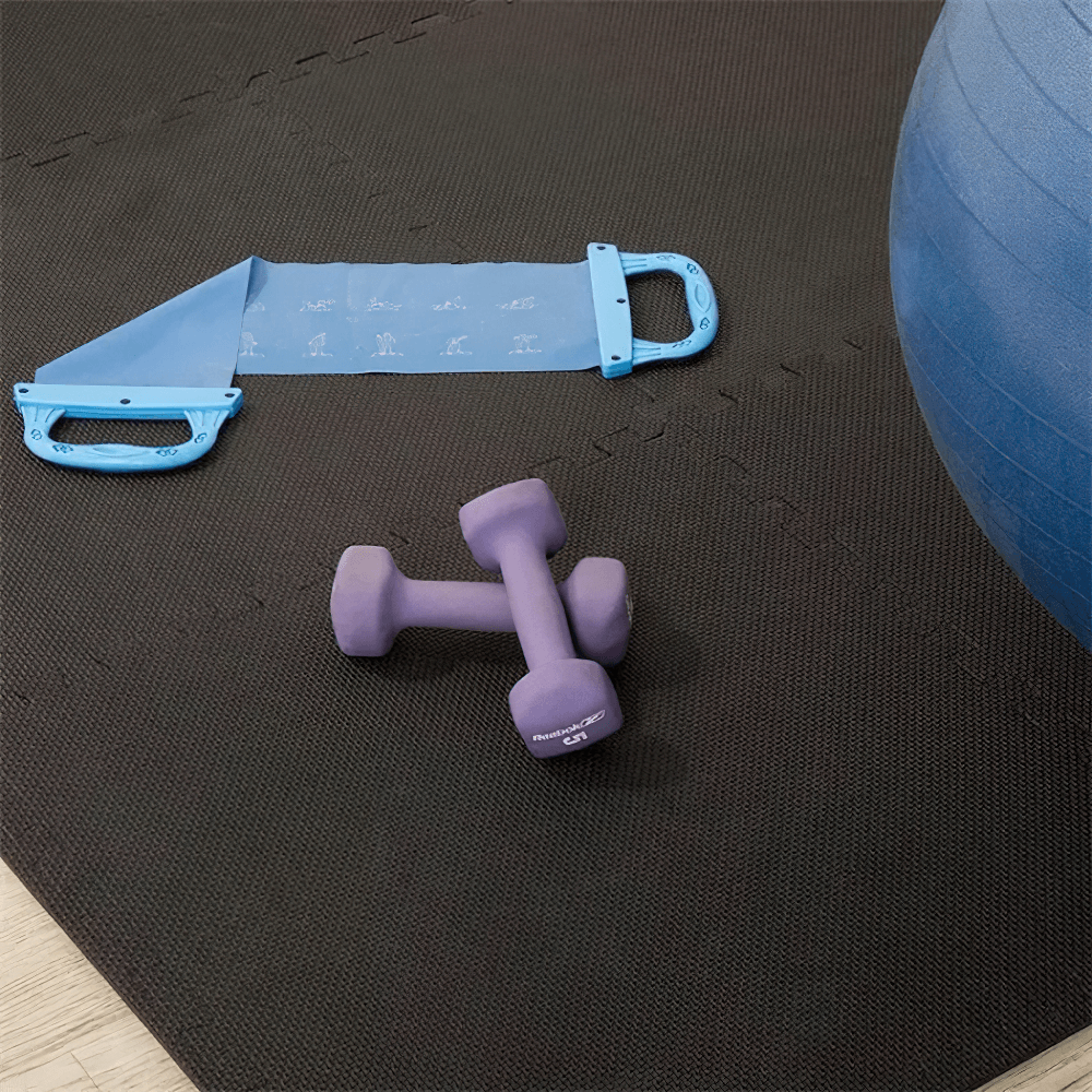Sports Protection Non-Slip Gym Mats - Cross Pattern EVA floor mats with purple dumbbells and blue exercise band on the mat.