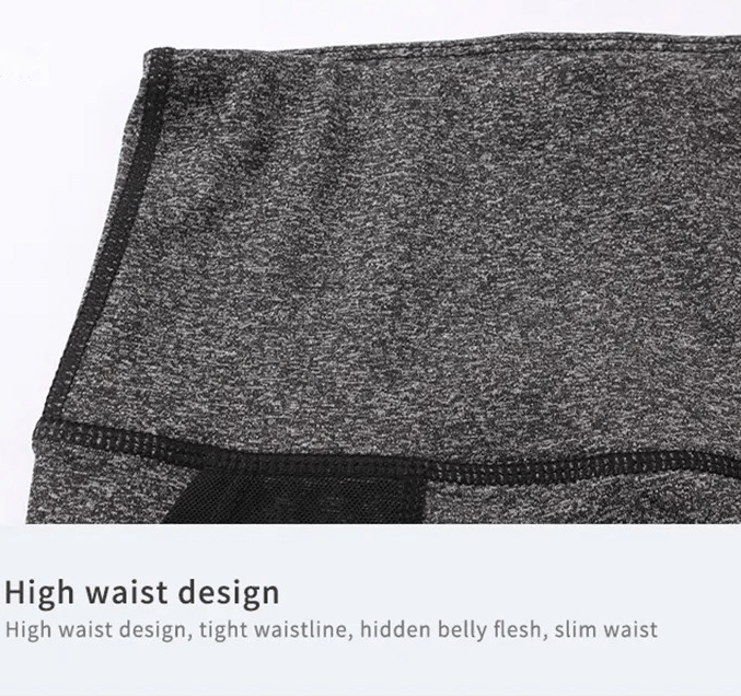 Close-up of the high-waisted design on women's quick-dry sports shorts, showcasing tight waistline and sleek patchwork details.