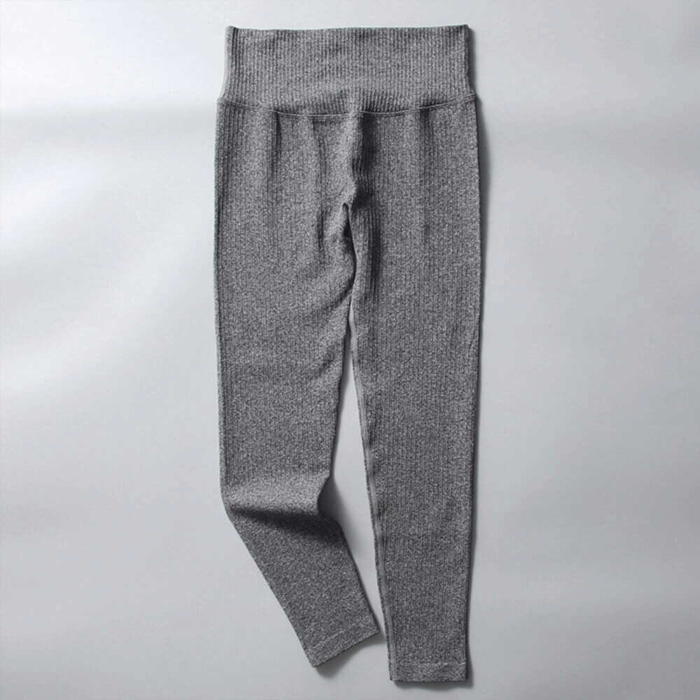 Grey seamless high waist ribbed leggings for women, crafted with comfort-focused nylon and spandex, perfect for yoga or workouts.