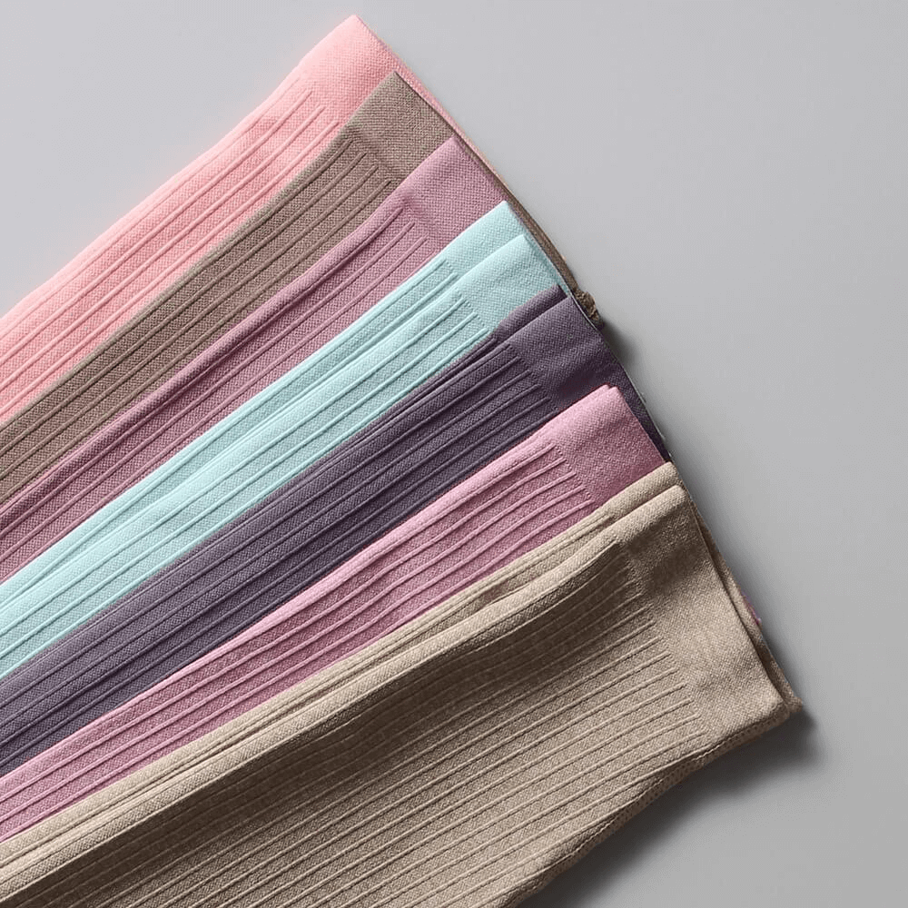 Colorful Sports Seamless High Waist Ribbed Leggings for Women displayed on a flat surface.