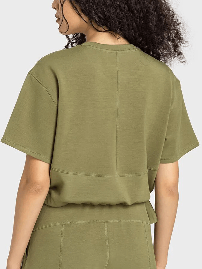 Back view of green sports short sleeves crop T-shirt with adjustable hem, perfect for fitness and casual wear.