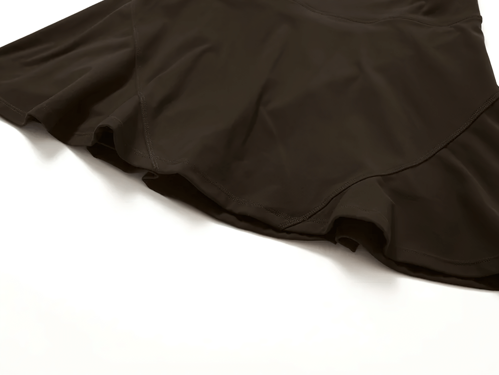 Stylish black sports skirt with built-in shorts, perfect for tennis and running. Enhance your activewear with a chic, breathable design.