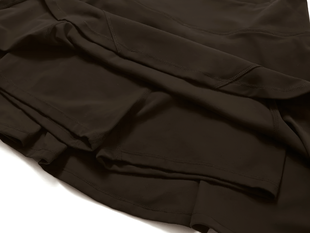 Close-up of sports skirt with built-in shorts for tennis, running, and fitness. Stylish and breathable activewear for ease of movement.