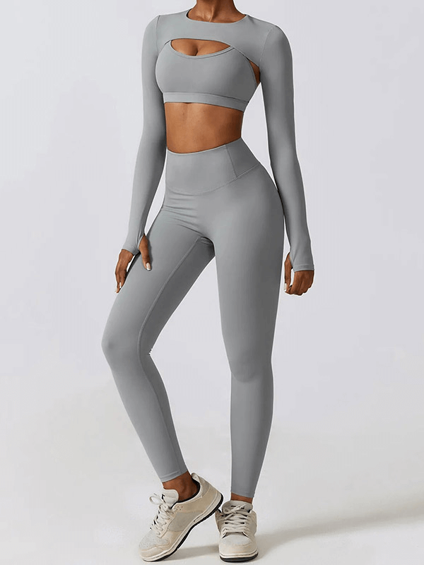 Gray sportswear yoga set for women, featuring a stylish long-sleeve top and leggings, perfect for fitness and outdoor activities.