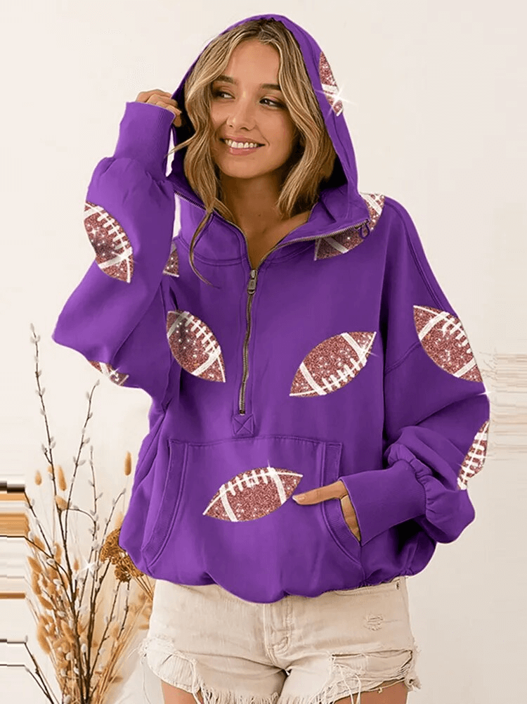 Sporty casual women's hoodie with front pockets and sequin footballs, perfect for activity; loose fit, hood, and comfort.