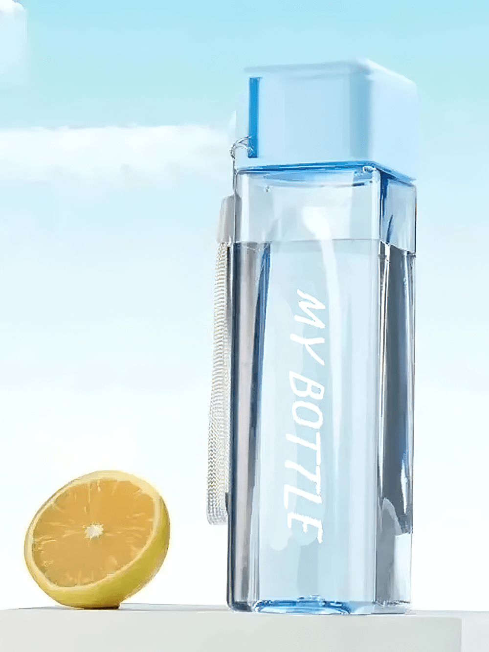 Square Plastic Water Bottle with Strap for Sports - SF3488, clear design with blue cap and lemon, ideal for gym and outdoor use.