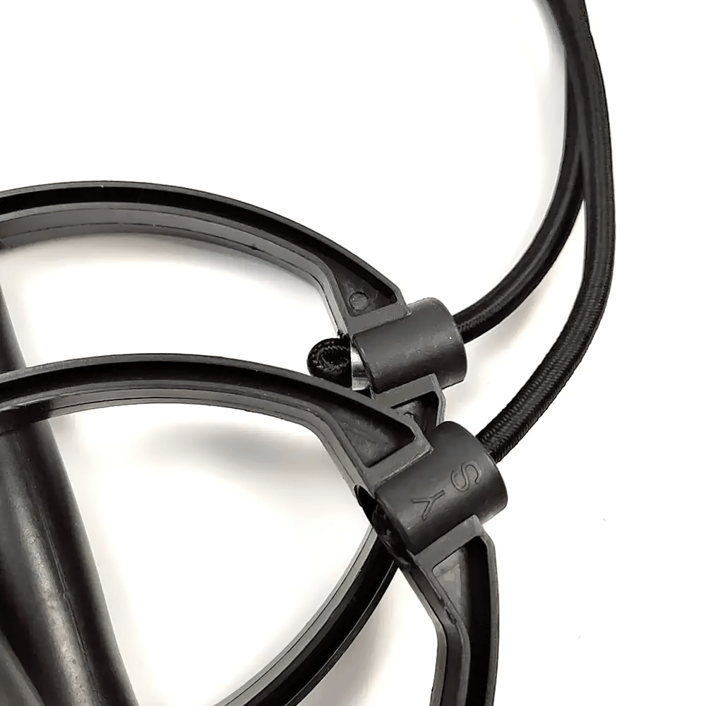 Close-up of black stepper resistance bands with secure handles, ideal for cardio and strength training at home.
