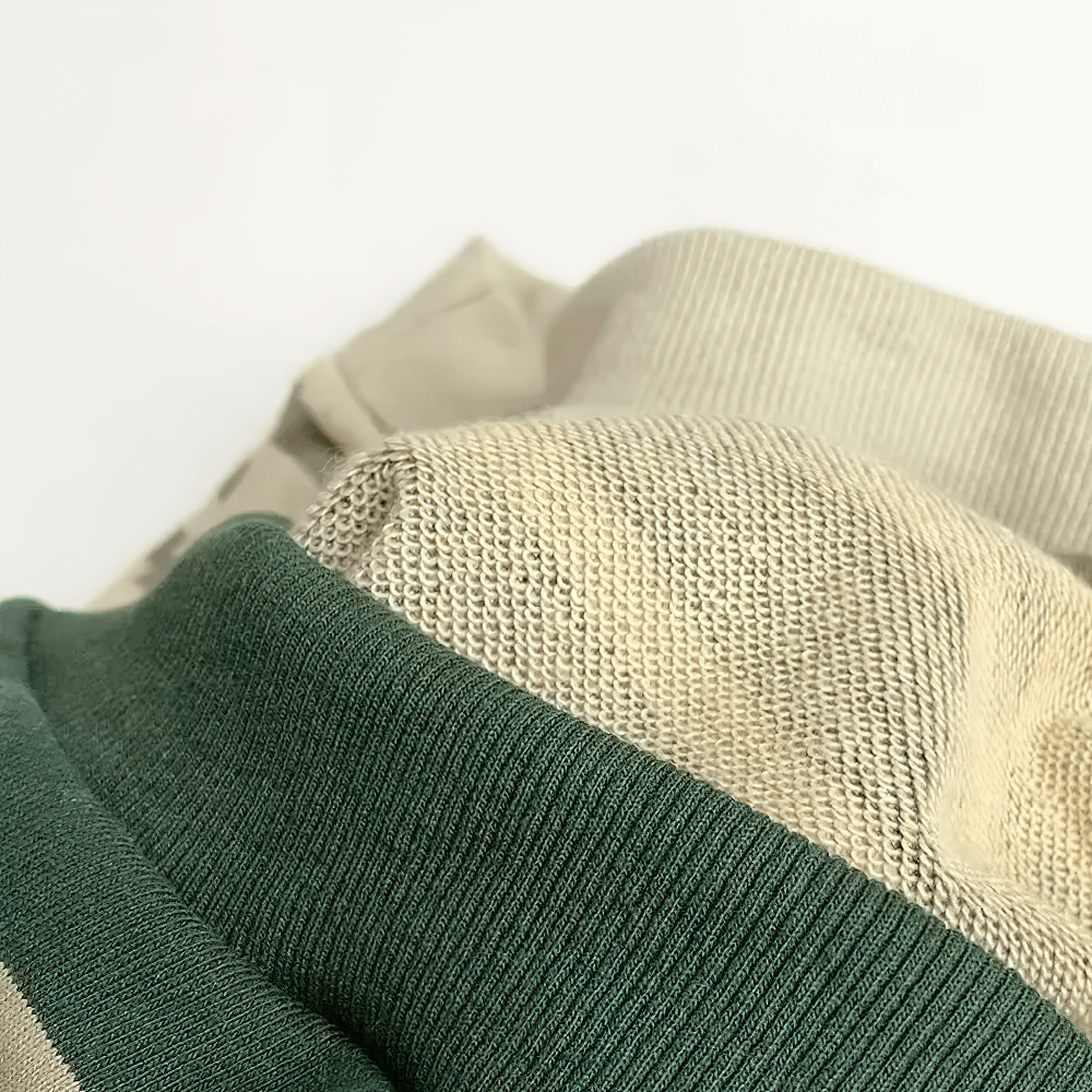 Close-up of the Striped Sweatshirt with Ribbed Cuffs - SF3553 showing its soft fabric and ribbed cuff detail in contrasting stripes.