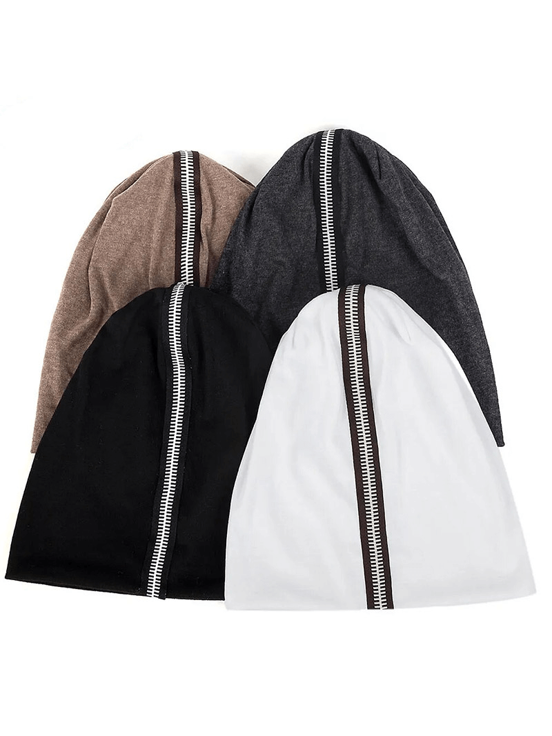 Four stylish cotton soft beanies with decorative zippers in brown, gray, black, and white colors, one size for unisex fashion.
