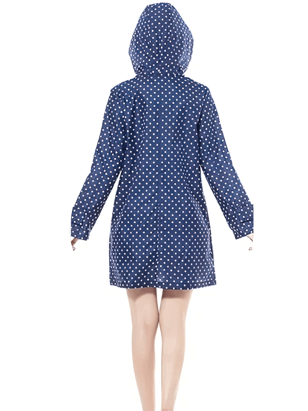 Back view of a navy blue polka dot waterproof hooded raincoat for women, designed in a stylish single-person poncho style.