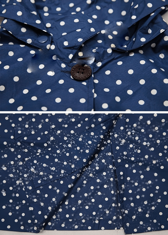 Close-up of Stylish Dot Raincoat in blue with white polka dots, featuring a waterproof design and hooded jacket style for women.