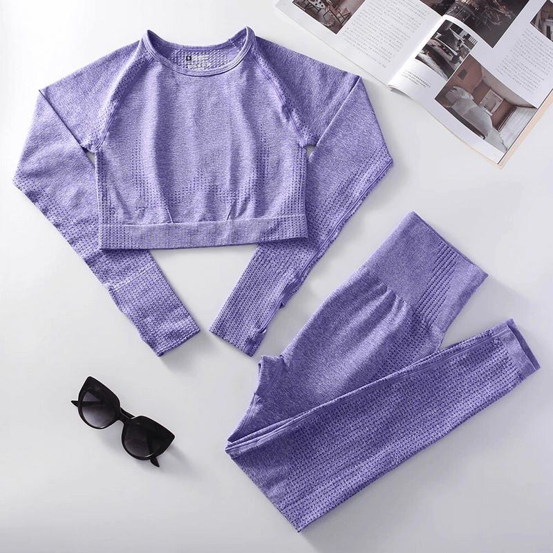 Stylish elastic women's suit in lavender with full-sleeve top and leggings, ideal for yoga and fashion, featuring high-stretch nylon.