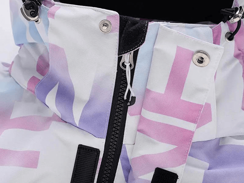 Close-up of a stylish letter-printed female ski jacket collar in pastel colors, featuring a zipper and snap buttons.