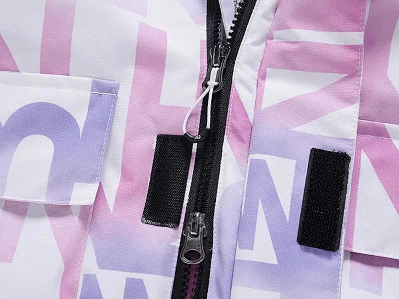 Close-up of the Stylish Female Letter Printed Ski Jacket with pink and purple pattern, featuring pockets and durable zippers for skiing.
