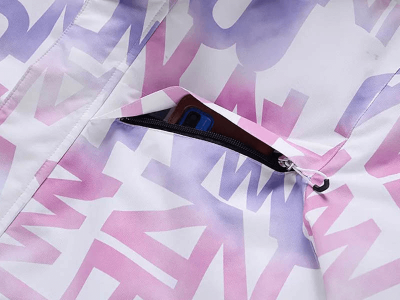 Close-up of Stylish Female Letter Printed Ski Jacket pocket with phone inside, featuring vibrant purple and pink letters.
