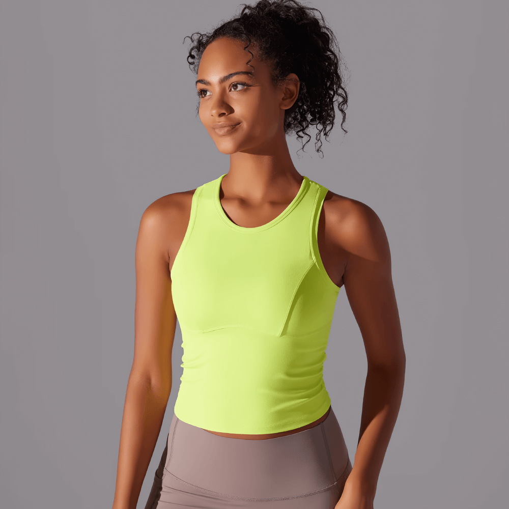 Stylish high-impact women’s sports tank top in neon yellow, perfect for yoga and fitness workouts.