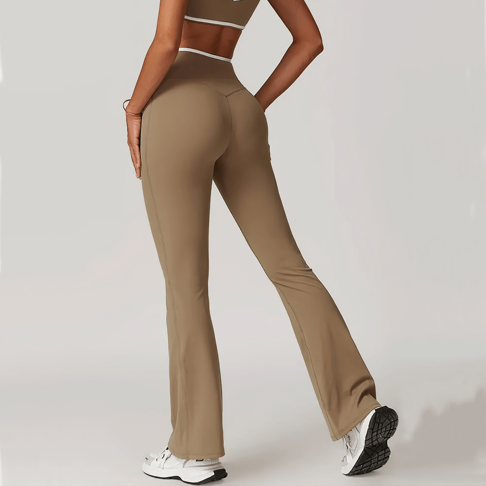 Stylish high-waist flared yoga pants for women in brown, perfect for fitness and dance, showing flexibility and chic design.