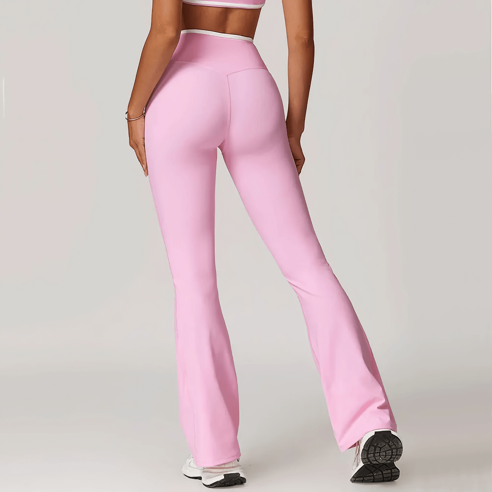 Back view of pink high-waist flared yoga pants for women, perfect for fitness and dancing, offering style and flexibility.
