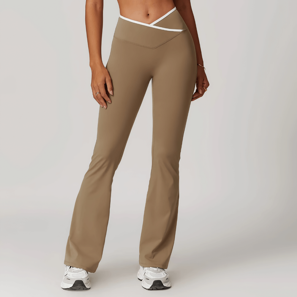 Stylish high-waist flared yoga pants for women in brown, featuring elastic bell-bottoms and a chic silhouette for activewear elegance.