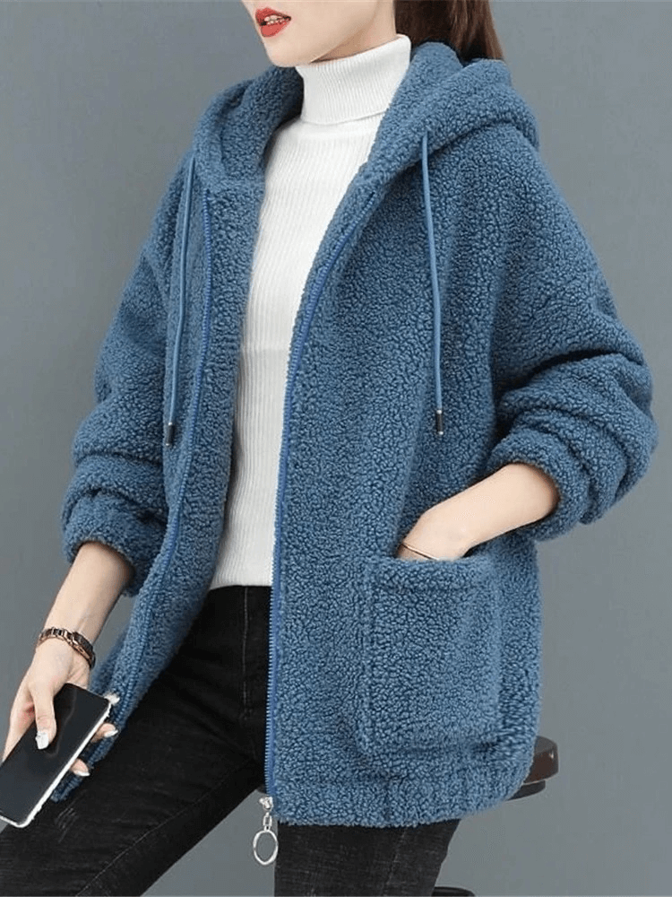 Stylish loose women's fleece jacket with hood, solid blue, cotton material, casual style, full-length sleeves for warmth.