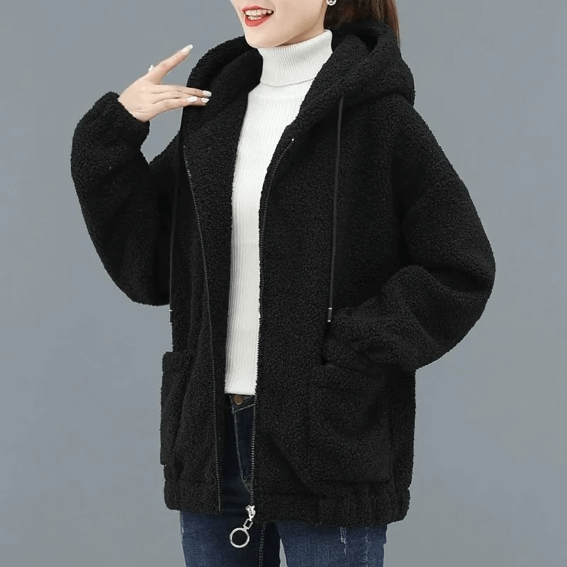 Stylish loose women's fleece jacket with hood, cotton material, solid black, full-length sleeves, zipper closure, casual look.