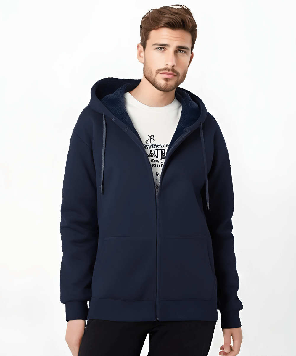 Stylish male wearing a casual fleece-lined zip-up hoodie in navy, offering warmth and style for cooler days.