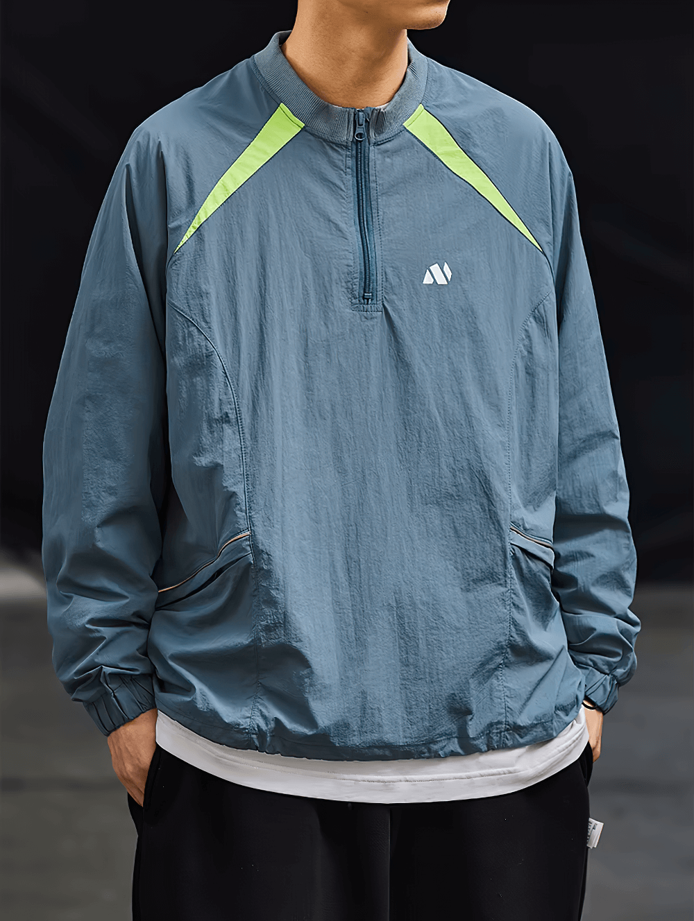 Stylish men's lightweight sports jacket with half-zip and neon accents, perfect for streetwear and casual activities.
