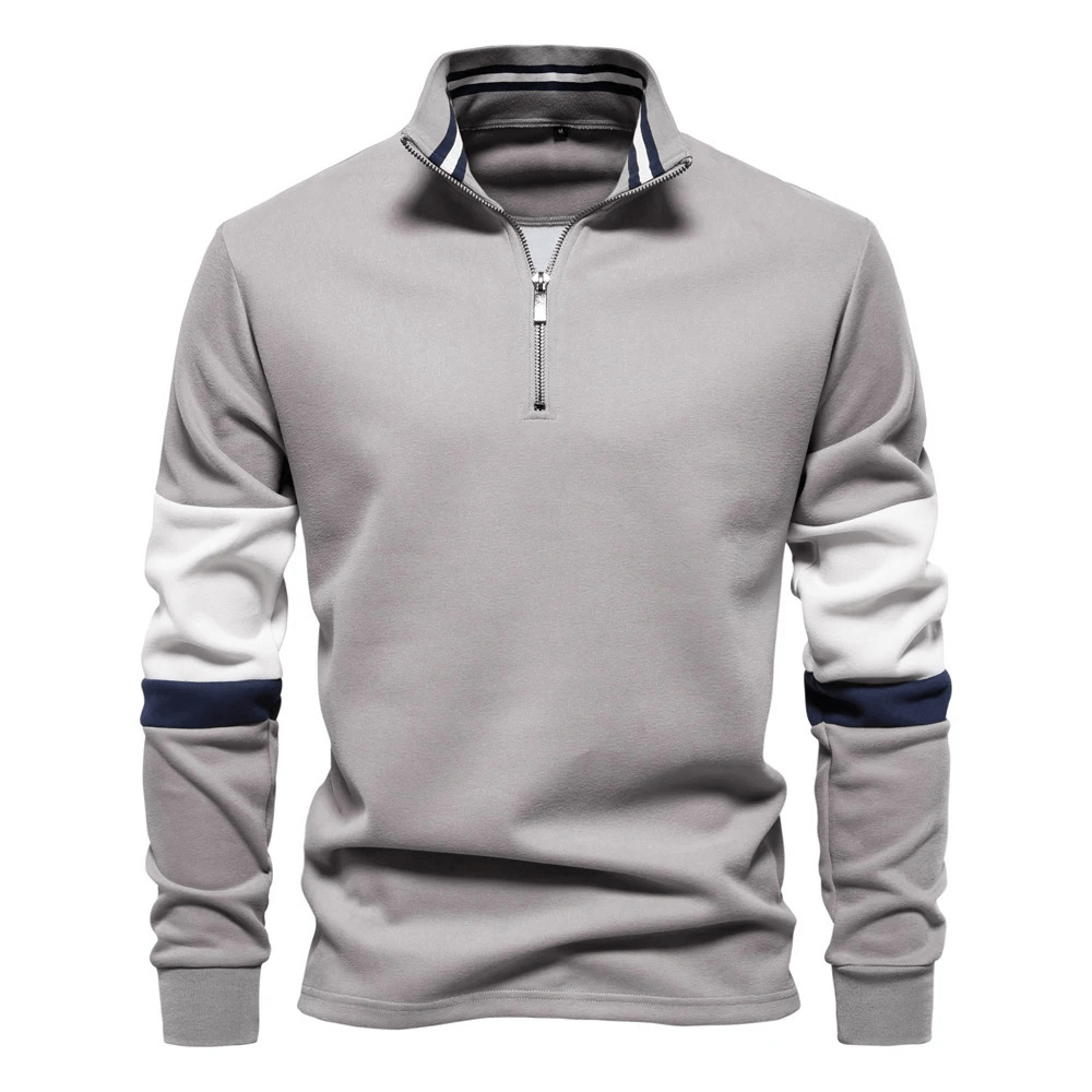 Men's grey quarter zip pullover with patchwork design and sleek mock neck. Stylish and versatile, perfect for layering. SF2535