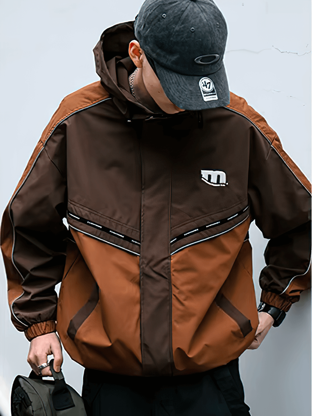 Stylish Men's Outdoor Reflective Hooded Jacket SF2273 in brown with a modern patchwork design, perfect for outdoor sports.