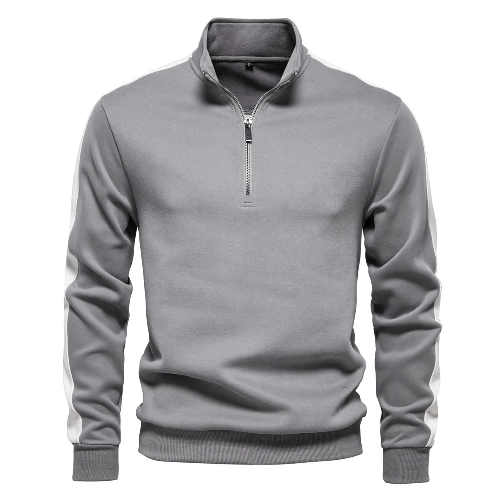 Stylish men's quarter-zip sport pullover in gray, featuring a stand collar and long sleeves, perfect for casual and sports occasions.