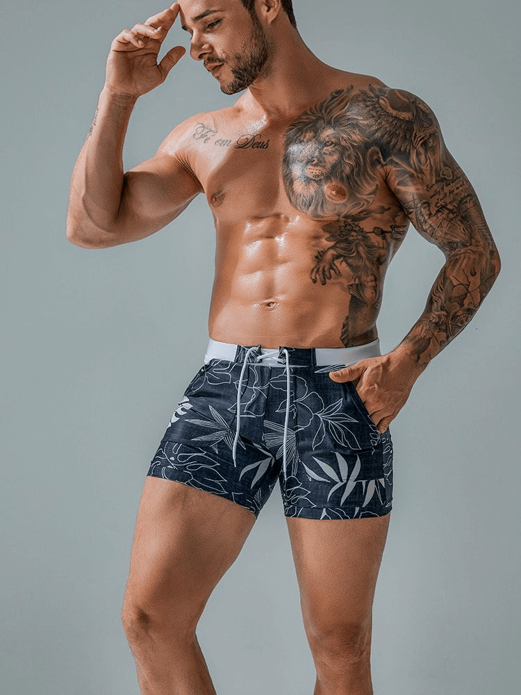 Stylish quick dry men's swim shorts with a modern print, featuring lightweight and breathable material, ideal for beach and outdoor fun.