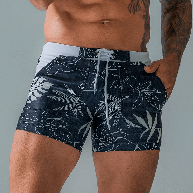 Stylish Quick Dry Men's Swim Shorts with Pockets in floral print, perfect for beach days and active wear, lightweight and breathable.