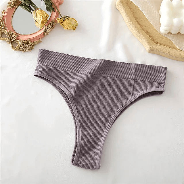 Stylish sexy seamless G-string in grey, crafted from spandex and polyester, offering a sleek and smooth fit for chic women's fashion.