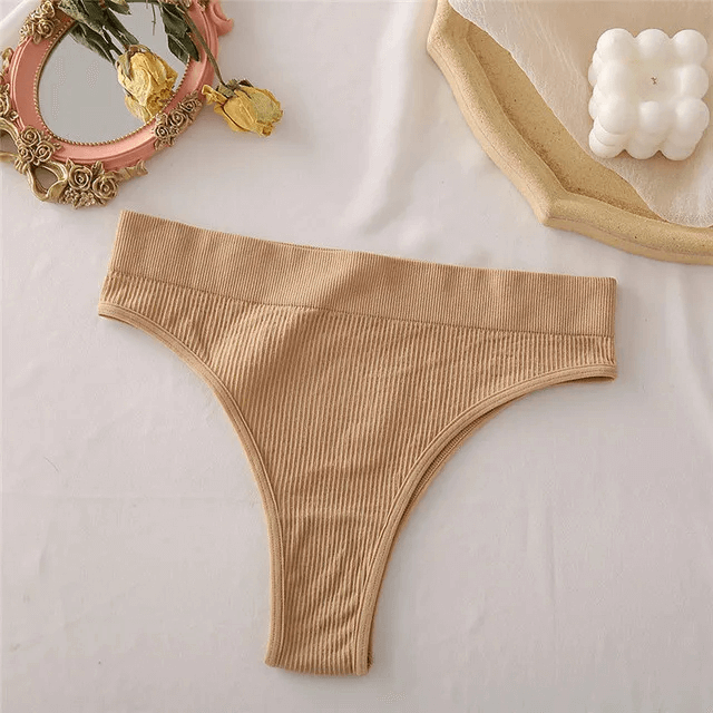 Stylish seamless beige G-string for sleek fit, made from spandex and polyester, perfect for any occasion. Ideal chic women's essential.