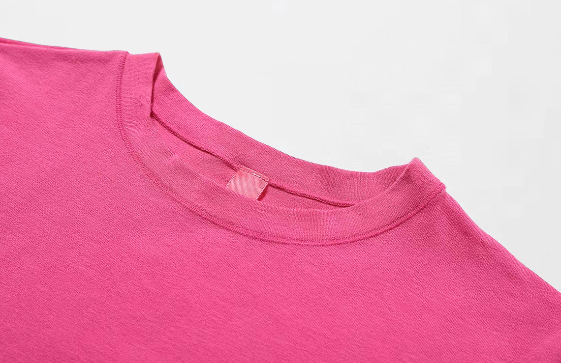 Pink stylish short-sleeve yoga t-shirt for women, SF2418, ideal for fitness and casual wear, made of breathable cotton-spandex blend.