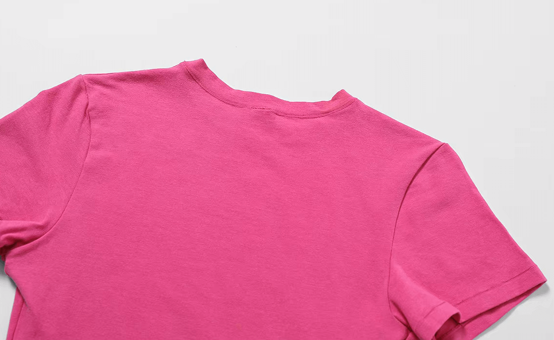 Back view of a pink short-sleeve yoga T-shirt for women, showcasing breathable cotton-spandex blend, perfect for fitness and casual wear.