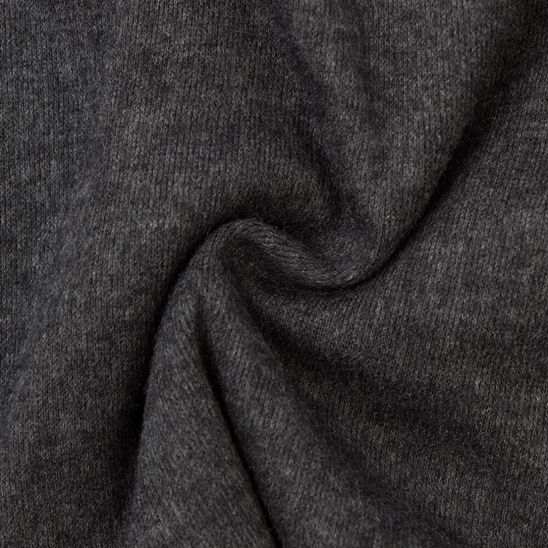 Close-up of dark gray polyester fabric texture, perfect for stylish women's beanie with rhinestones, adding sparkle to casual wear.