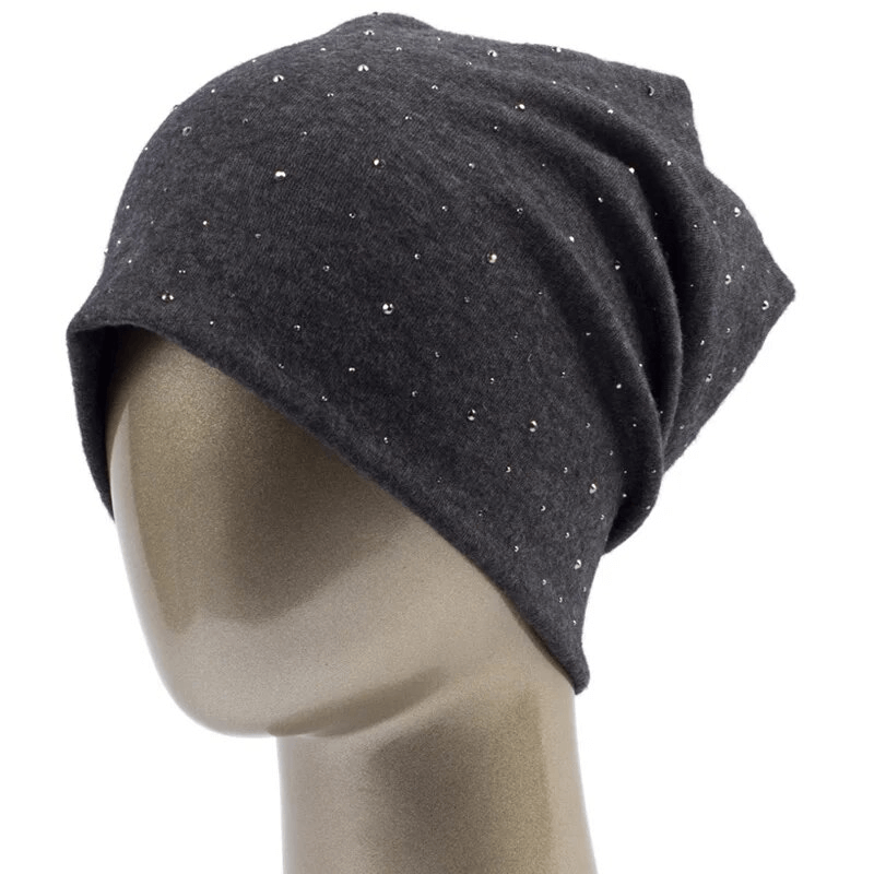 Stylish solid color women's beanie with sparkling rhinestones, perfect for casual wear, made of lightweight polyester. Model: SF1689.