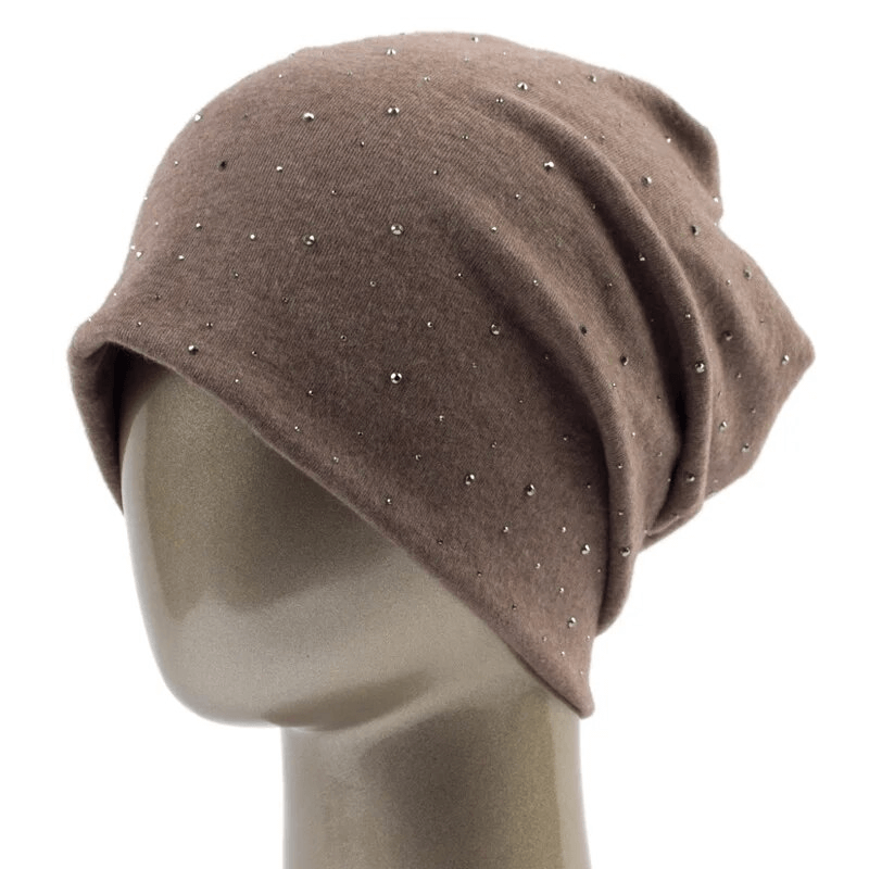 Stylish solid color women's beanie with rhinestones, made of lightweight polyester, perfect for a casual look. SF1689 fashion accessory.