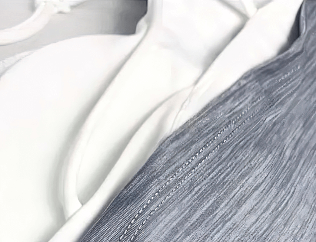 Close-up of a stylish, sporty women's tank top with soft lining and textured fabric.