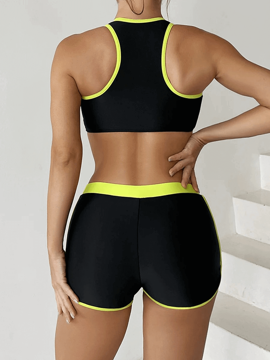 Back view of Stylish Tight Sports Women's Two-Piece Swimsuit SF1879 in black with neon trim, ideal for active swimming.