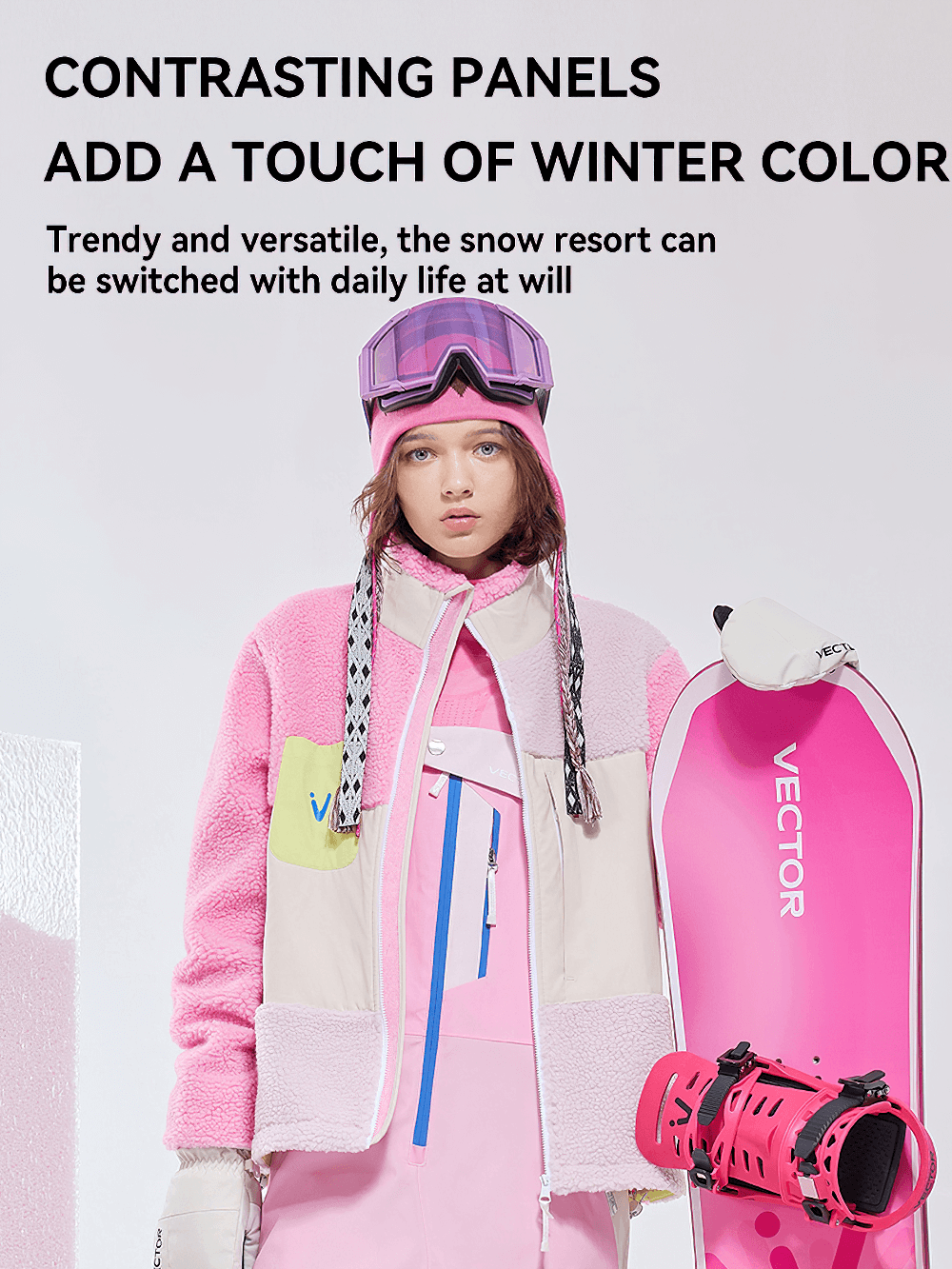 Person in unisex sherpa fleece jacket with snowboarding gear, showcasing striking color contrasts for winter sports.