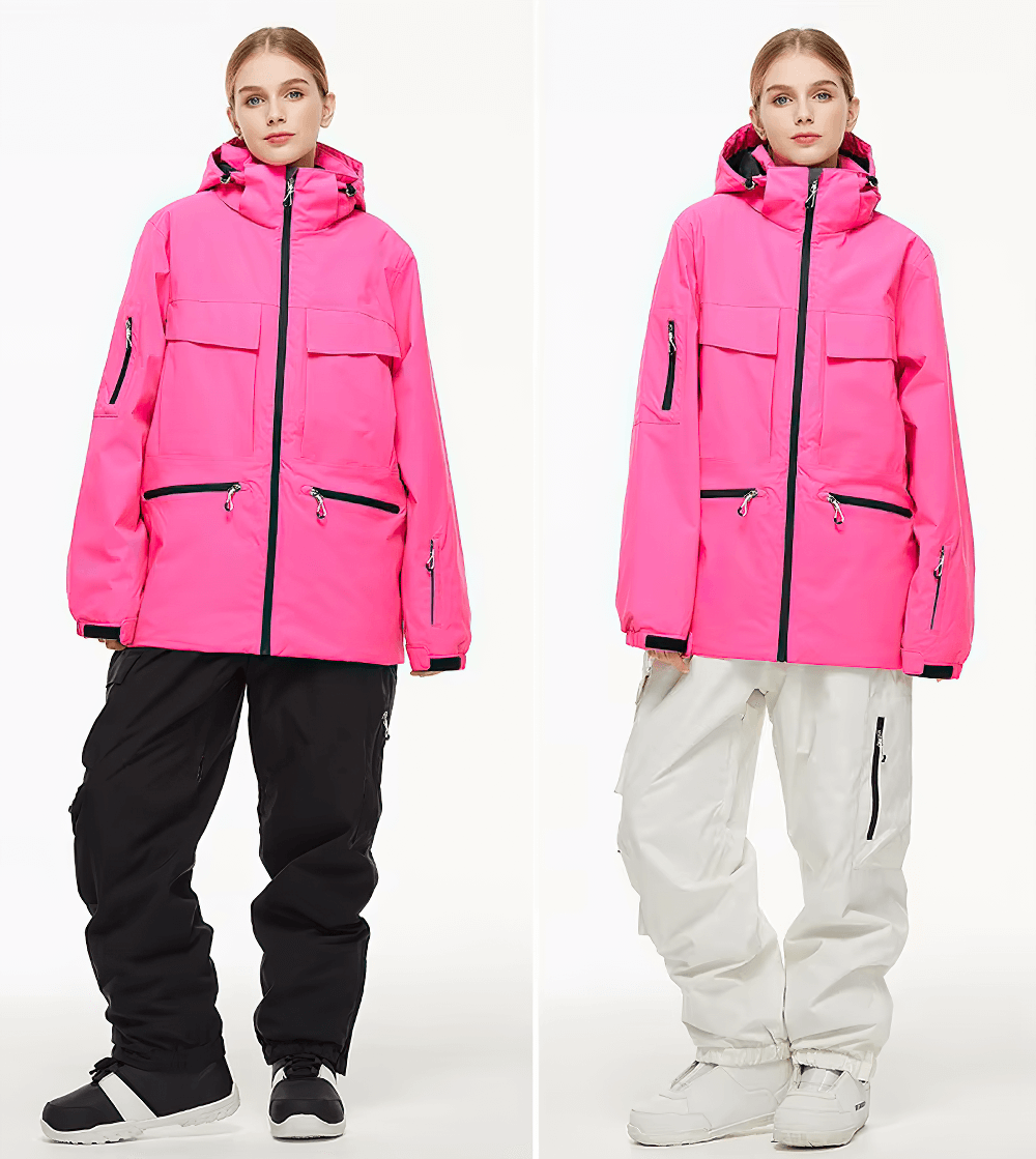 Two models wearing stylish unisex waterproof ski jackets in pink with black and white pants, perfect for skiing and snowboarding.