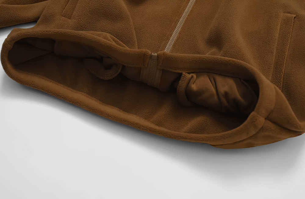 Brown fleece jacket with zipper, featuring anti-pilling fabric and windproof design. Perfect for outdoor activities like running and hiking.