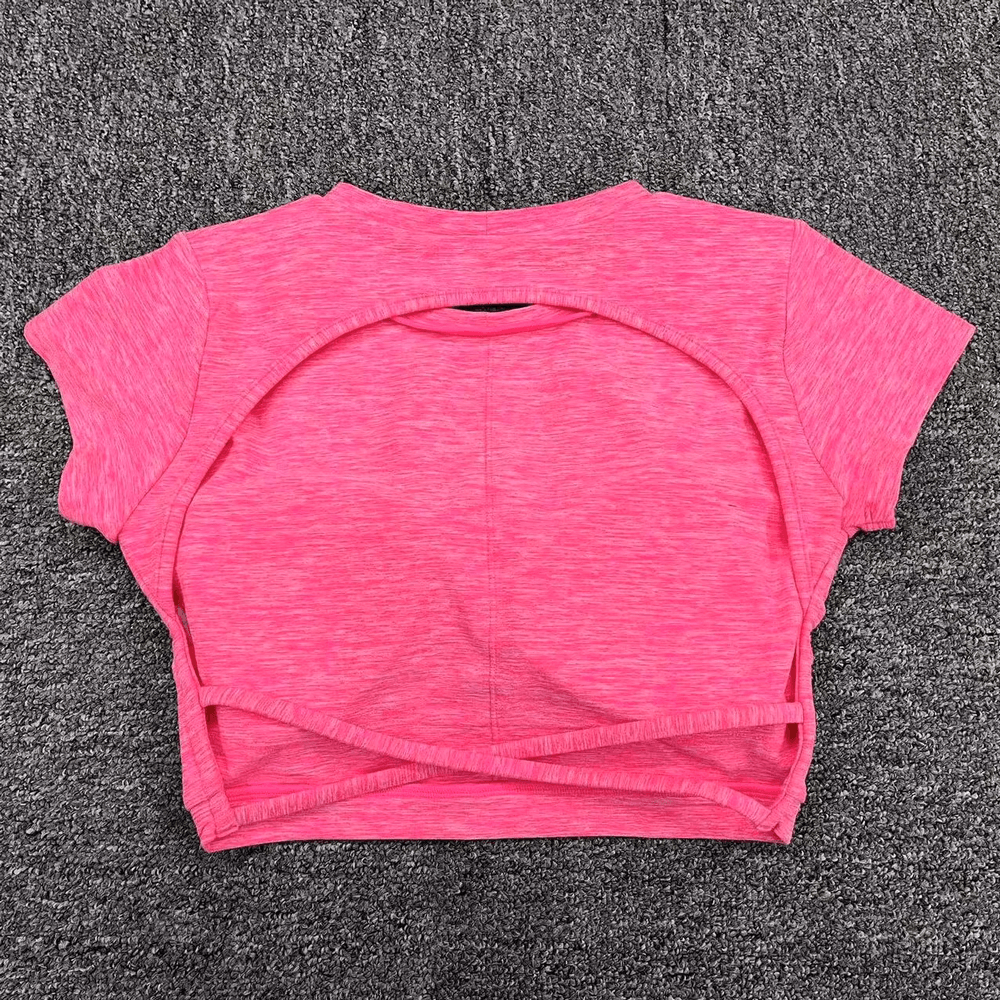 Hot pink women's backless t-shirt with short sleeves, perfect for yoga and fitness. Made from nylon and spandex blend. Product code: SF2430.