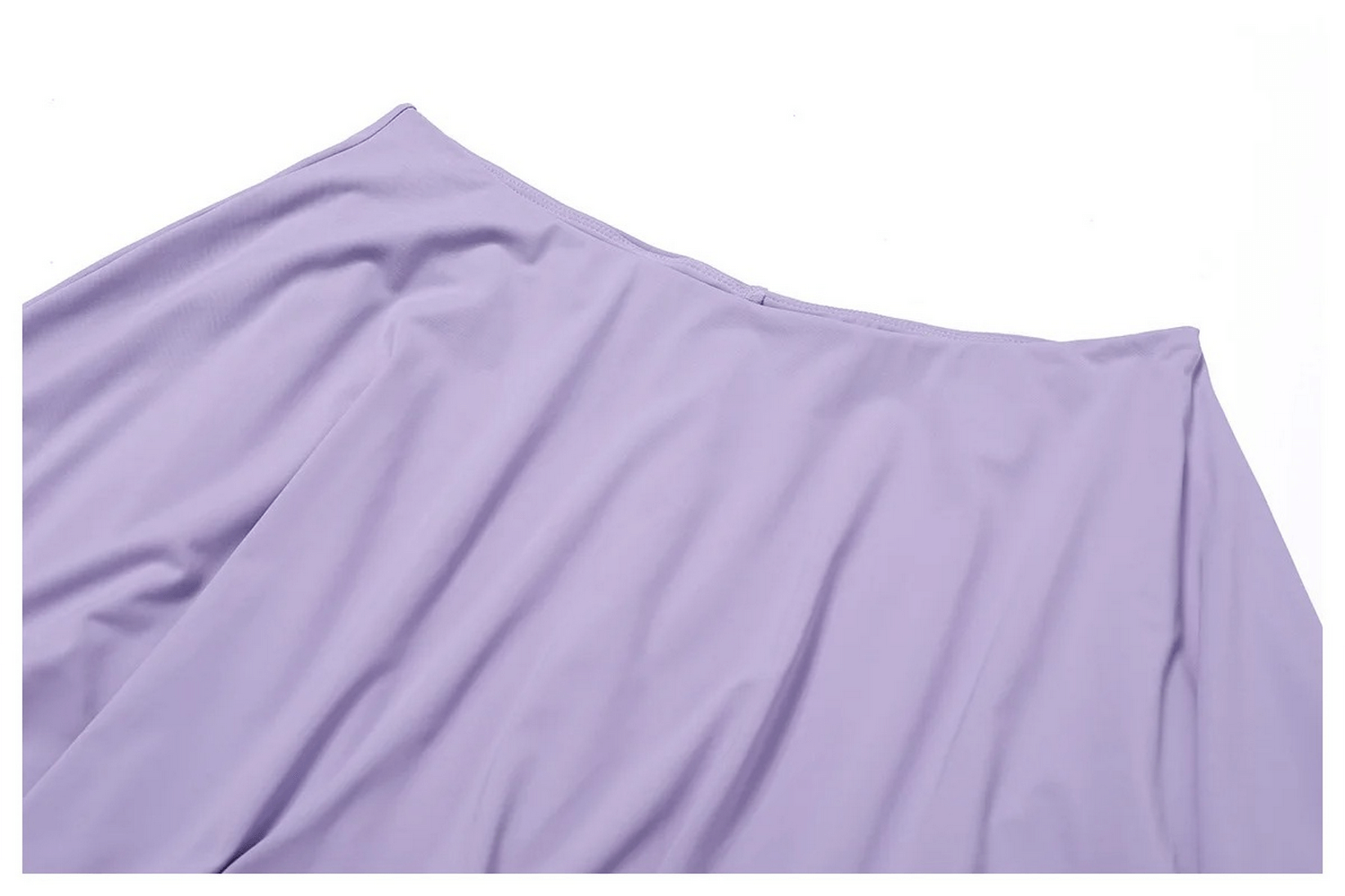 Close-up of a stylish purple flared sports skirt for women, made from nylon and spandex. Perfect for activewear and dance.