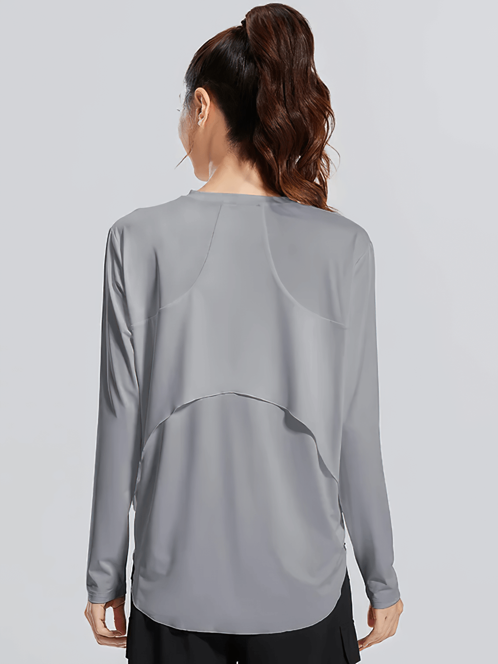 Back view of Stylish Womens Long Sleeve Top for Fitness - SF4133, featuring breathable polyester and quick-dry design for yoga workouts.