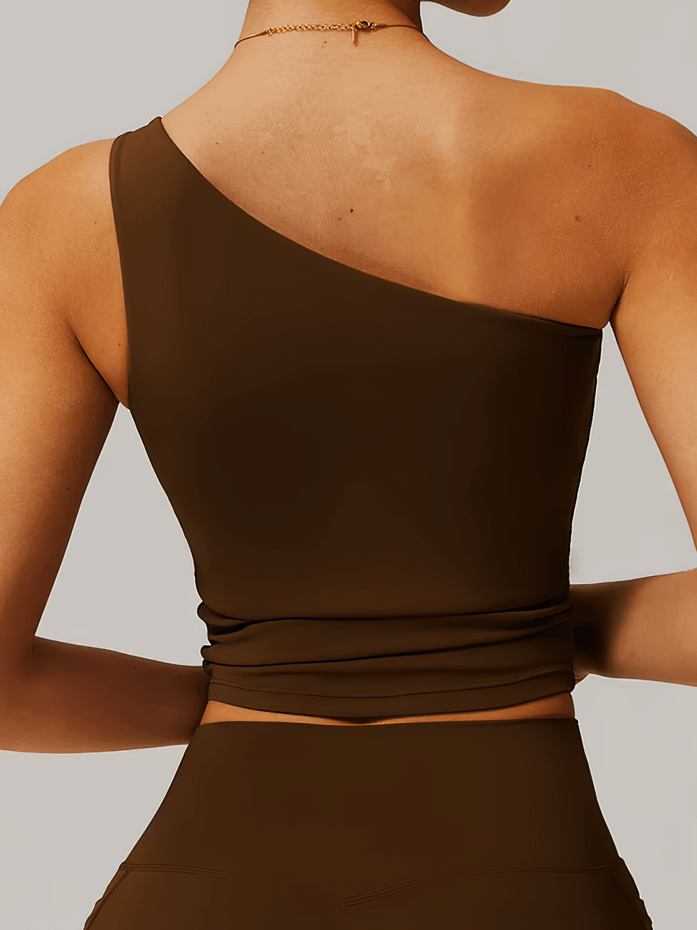 Stylish Women's One-Shoulder Fitness Tank Top SF2439 in brown, back view, breathable nylon and spandex, ideal for active wear.