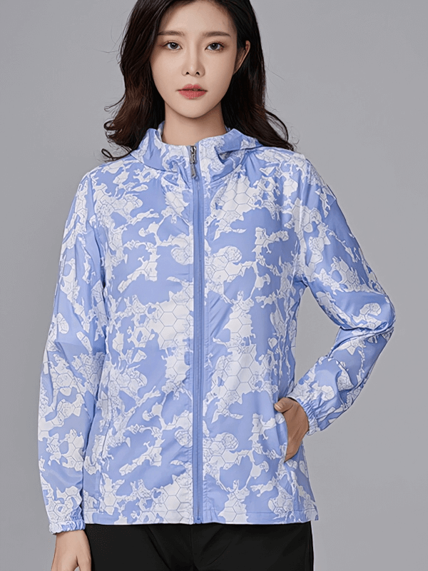 Sun-protective waterproof women's windbreaker jacket in blue with a zipper, ideal for camping and hiking.