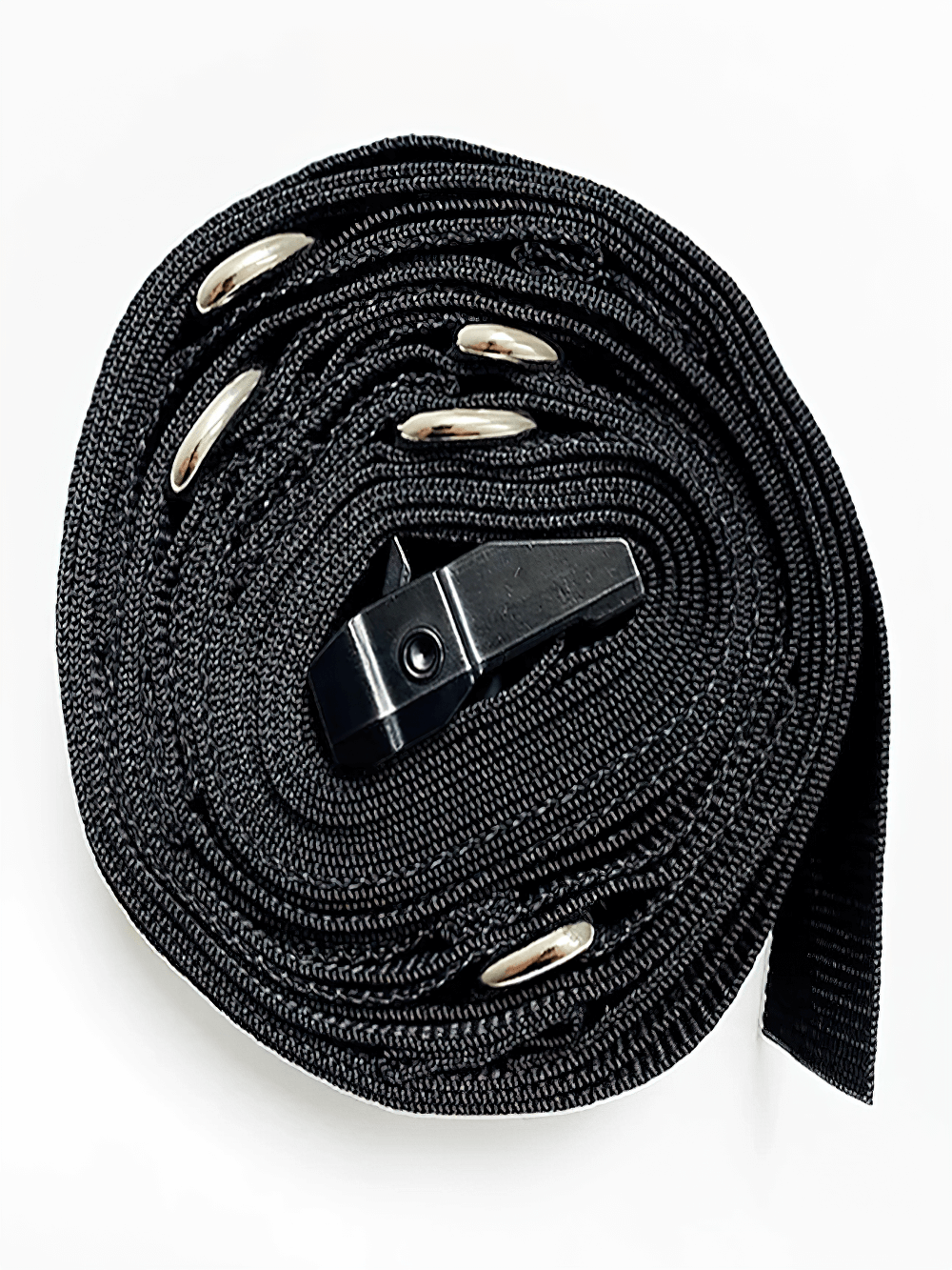 Suspension training strap rolled up with door anchor for full body workout, featuring durable resistance for at-home fitness routines.